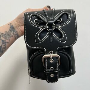 BNWOT - Delia’s Y2K inspired butterfly mini backpack.